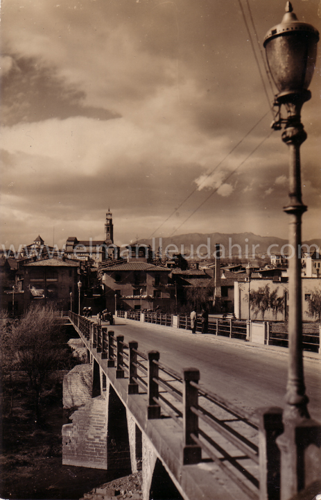 Manlleu. El Pont de can Moles. Comercial Prat. Any 1959.